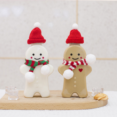 Botellas plásticas del jugo de la Navidad con el casquillo a prueba de fugas, botellas vacías del té de la leche