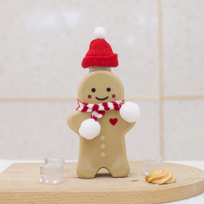 Botellas plásticas del jugo de la Navidad con el casquillo a prueba de fugas, botellas vacías del té de la leche