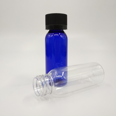Botellas redondas de plástico azul cobalto de 1 oz con tapa con costilla negra