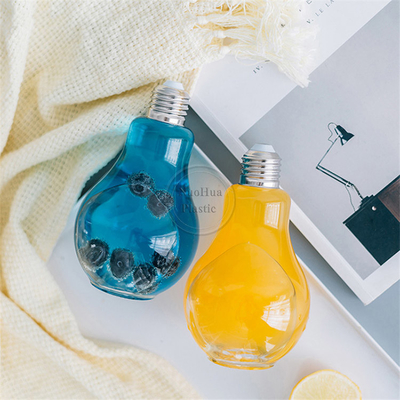 Por mayor Prensa en frío personalizada Muestras redondas de botellas de plástico para jugo botellas de jugo de plástico 12pz