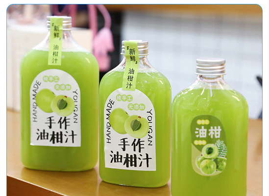 Botellas de té de leche cuadradas y redondas modernas con mango aislante