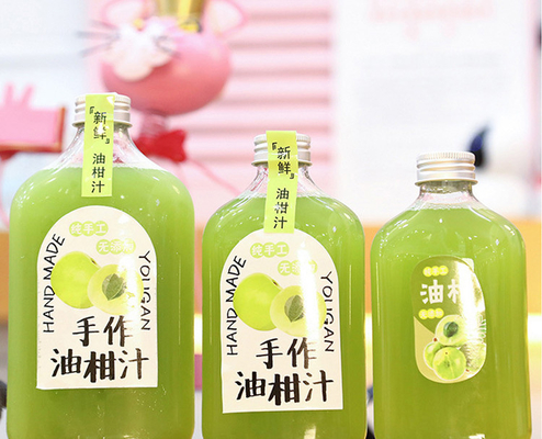 Botellas de té de leche cuadradas y redondas modernas con mango aislante