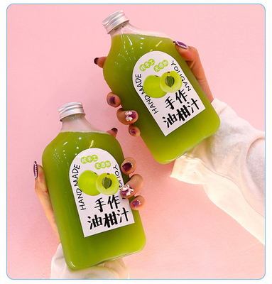 Botellas de té de leche cuadradas y redondas modernas con mango aislante