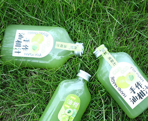 Botellas de té de leche cuadradas y redondas modernas con mango aislante