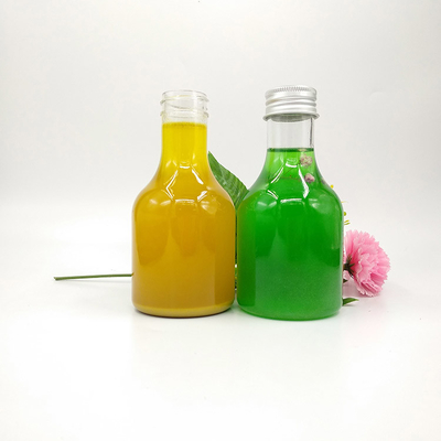 Botellas redondas de té de leche cuadrada y clara para agua de té de jugo