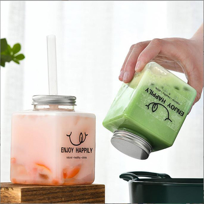 Botellas modernas de té de leche con tornillo en la tapa de material plástico