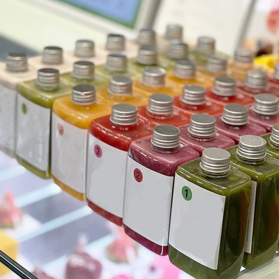 Botellas de té de leche de plástico a prueba de fugas con mangos ergonómicos