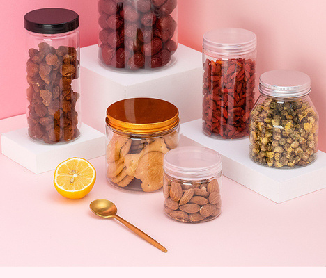 Fabricante mayorista de frascos vacíos transparentes frascos de plástico para nueces de caramelo por encargo frascos de plástico transparentes con tapas