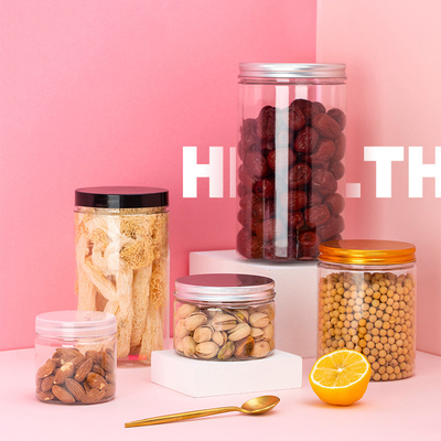 Fabricante mayorista de frascos vacíos transparentes frascos de plástico para nueces de caramelo por encargo frascos de plástico transparentes con tapas