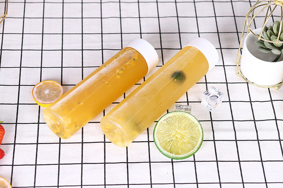 Flascas de bebidas reutilizables a prueba de fugas con estilo Cuadrado claro / redondo Modernos tornillos de plástico con tapa para un uso fácil