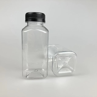 Botellas de té de leche de plástico transparente cuadradas a prueba de fugas con asas duraderas