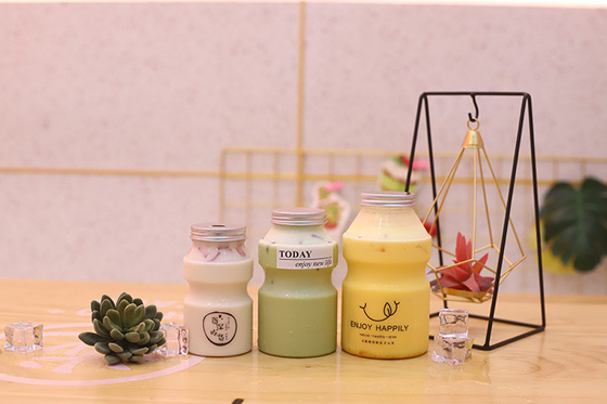 Botellas de té de leche de tamaño medio con tornillo en la tapa con capacidad de 0,5 kg