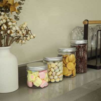 Fabricante del producto: Tarros de plástico con tapas. Tarros de plástico para envasado de alimentos. Tarro de plástico transparente con logotipo personalizado.