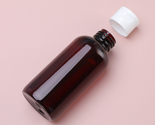 Botellas de loción de plástico de cuello de HDPE con etiquetado de superficie de manejo y capacidad de botella de 250 ml