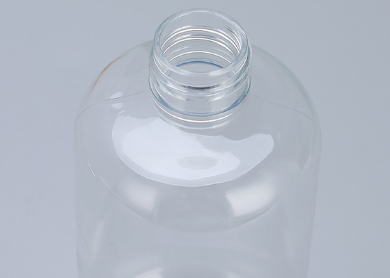 La botella vacía del champú con acero inoxidable bombea las botellas plásticas para los aceites esenciales, las lociones y el jabón líquido