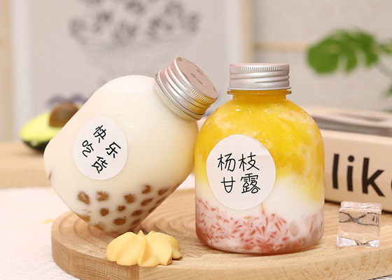 Botella de jugo PET bebida plástico transparente envase vacío botella de enzimas de té de leche con tapa