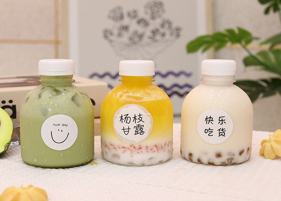 Botella de jugo PET bebida plástico transparente envase vacío botella de enzimas de té de leche con tapa