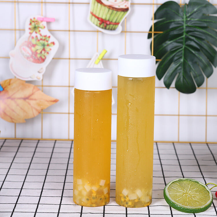 Manija Sí Botellas de té de leche 05kg Torsión en la tapa Diseño a prueba de fugas Ideal para el embalaje y distribución comercial de bebidas