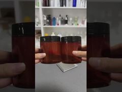 Envase cosmético de crema de plástico vacío de lujo a granel con tapas